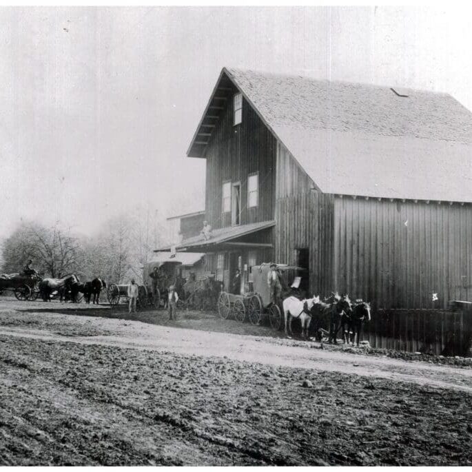 1890 Wagons Unloading Grain with Country Store Addition
