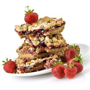 homemade  fruit bars filled with strawberry jam and fresh berries